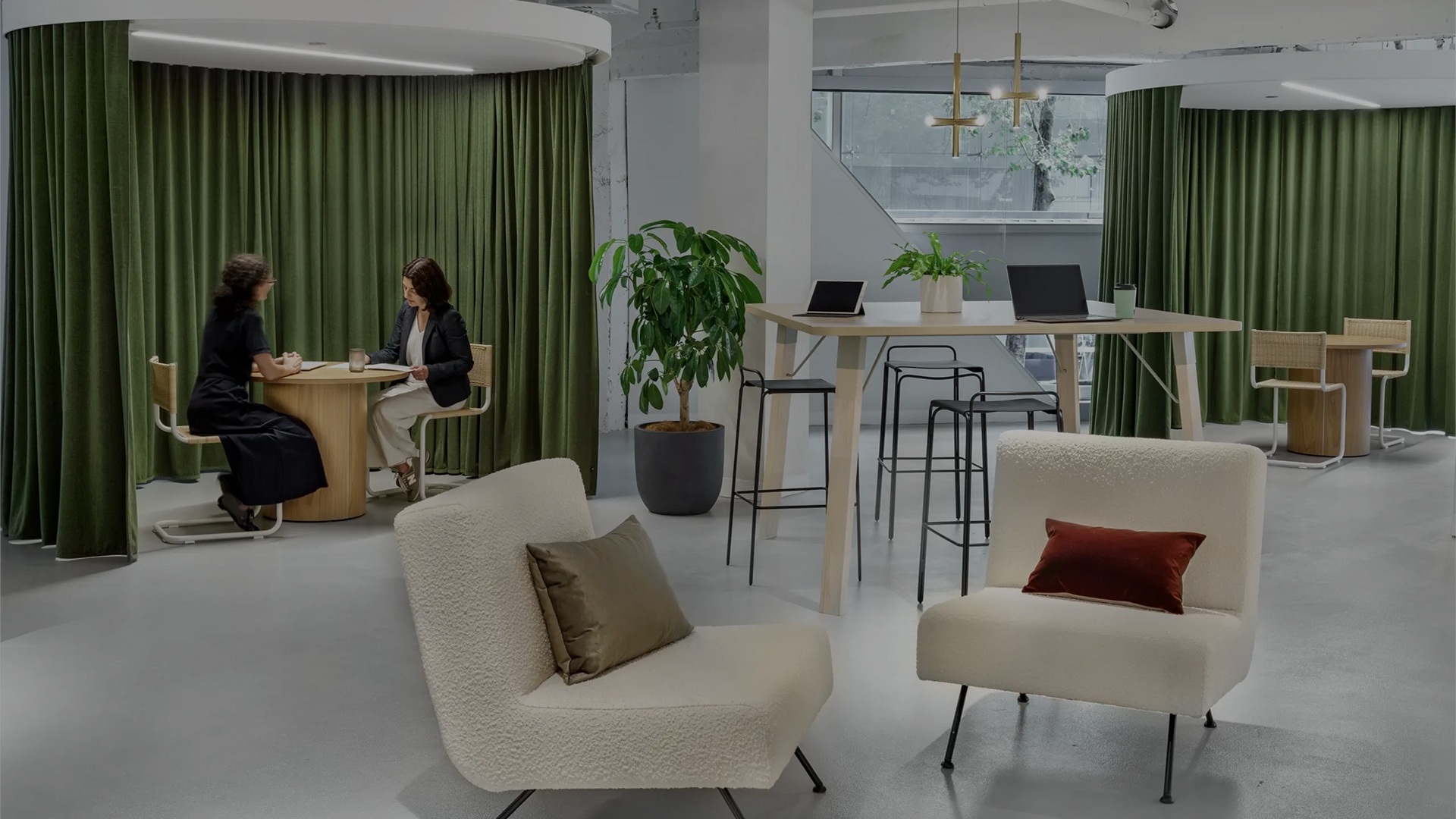 IPG office lounge with green curtains
